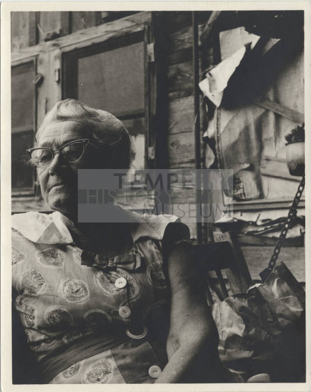 Portrait of Estelle C. Hackett on Porch