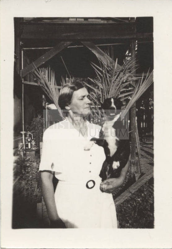 Photograph of Estelle Hackett and a Dog