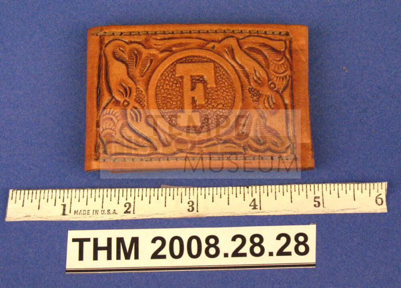 Leather tooled belt buckle