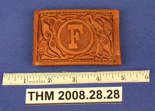 Leather tooled belt buckle