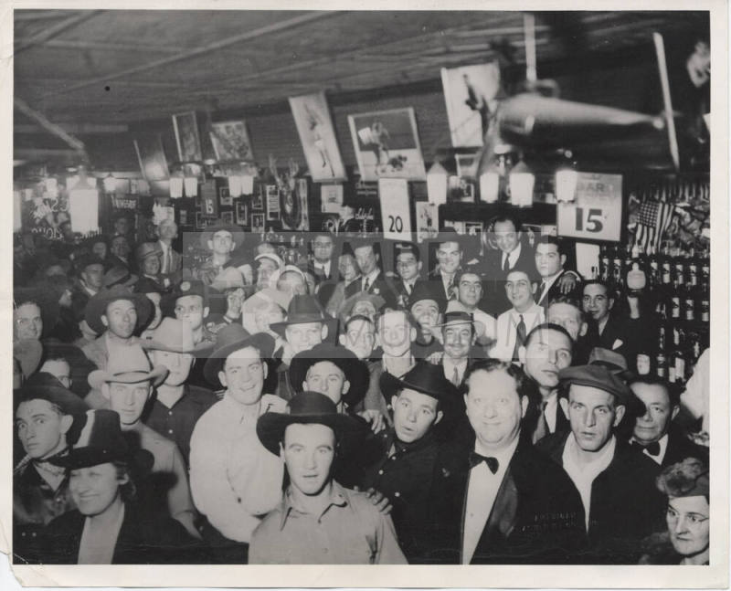 Luther Finley with Saloon Customers