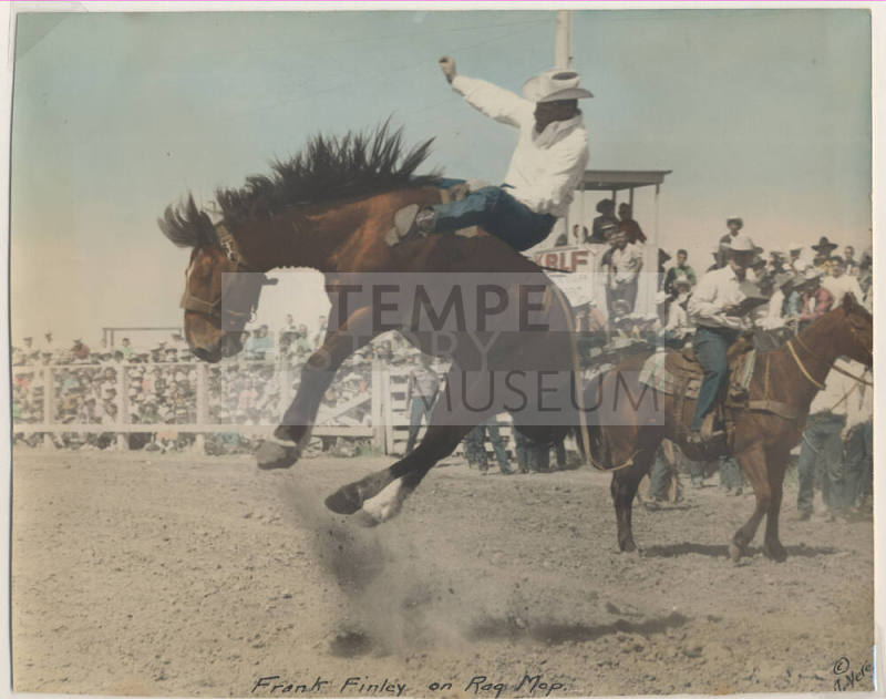 Colorized Photo of Frank Finley on a bucking horse named "Rag Mop"