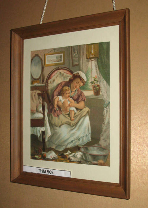Mother bathing child