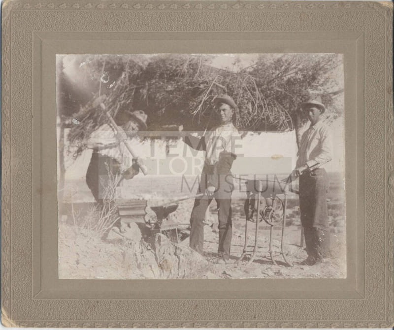 Three Men Using a Forge, Anvil and Tools
