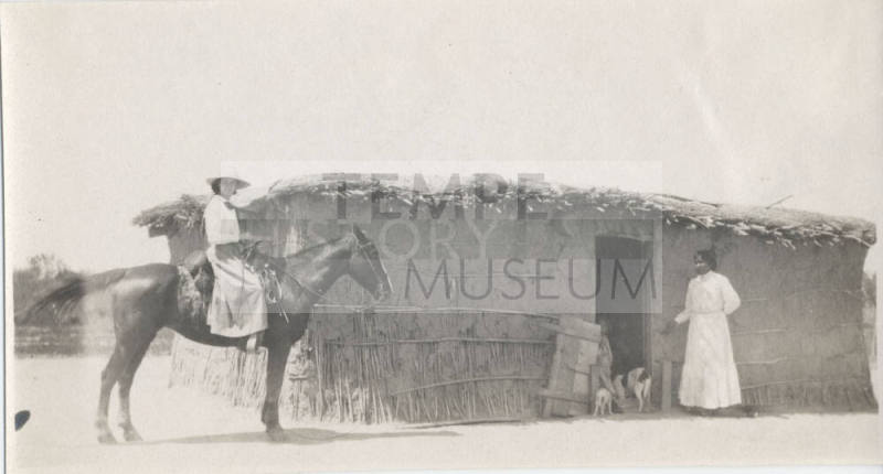 A (Pima?) Residence, 2 Women Out Front