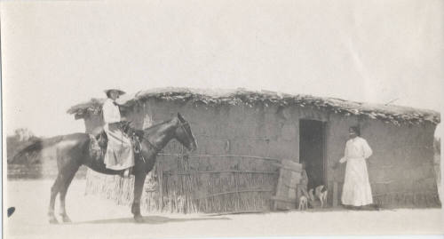 A (Pima?) Residence, 2 Women Out Front