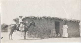 A (Pima?) Residence, 2 Women Out Front