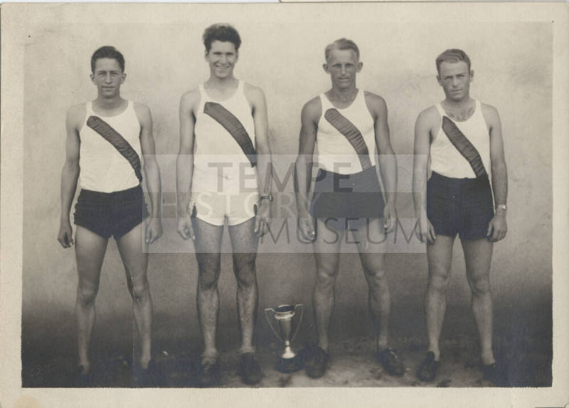 Four Runners with Trophy