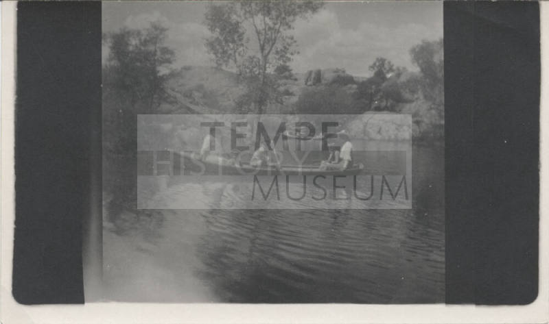 Two Rowboats with Campers on Scenic Lake