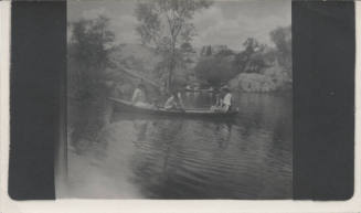 Two Rowboats with Campers on Scenic Lake