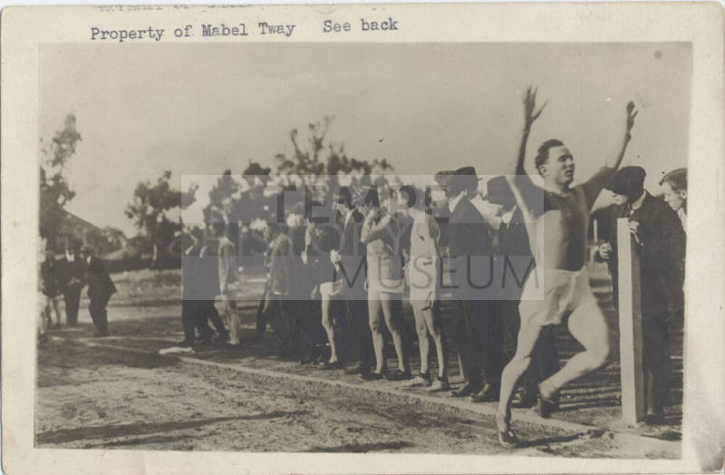 One Runner with Line of Spectators