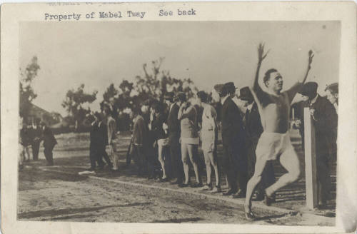 One Runner with Line of Spectators