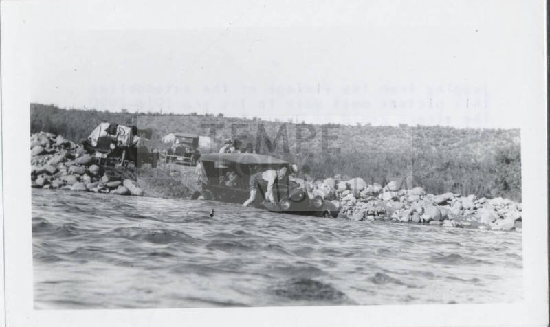 Automobile Stuck in Flooded Wash