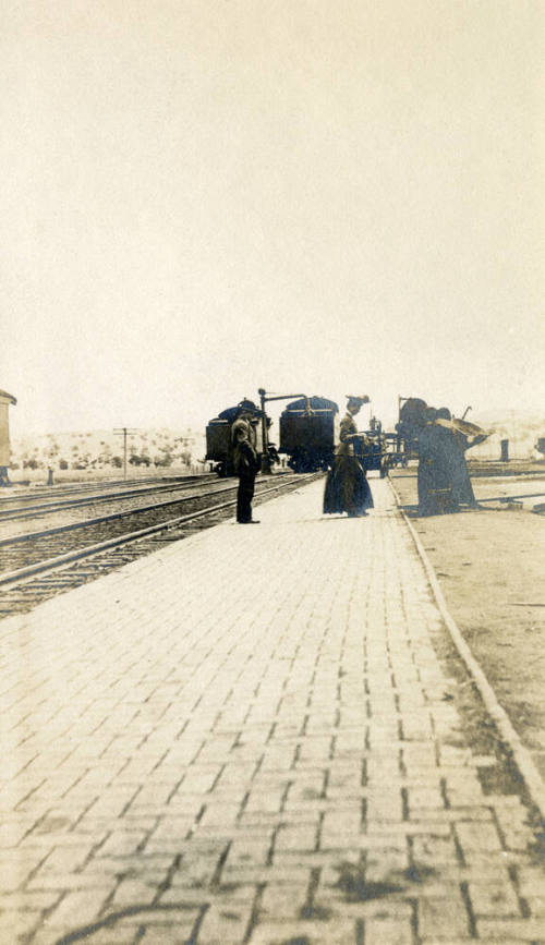 Man, Woman and Apache Women at Tempe Depot