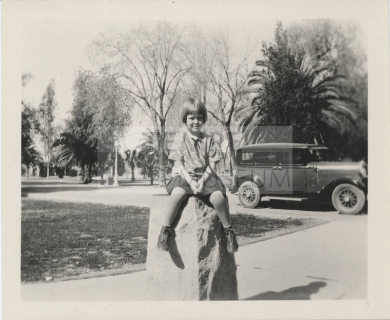 Childs Photograph with Car as Background