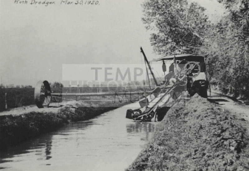 Dredger at Work on Canal