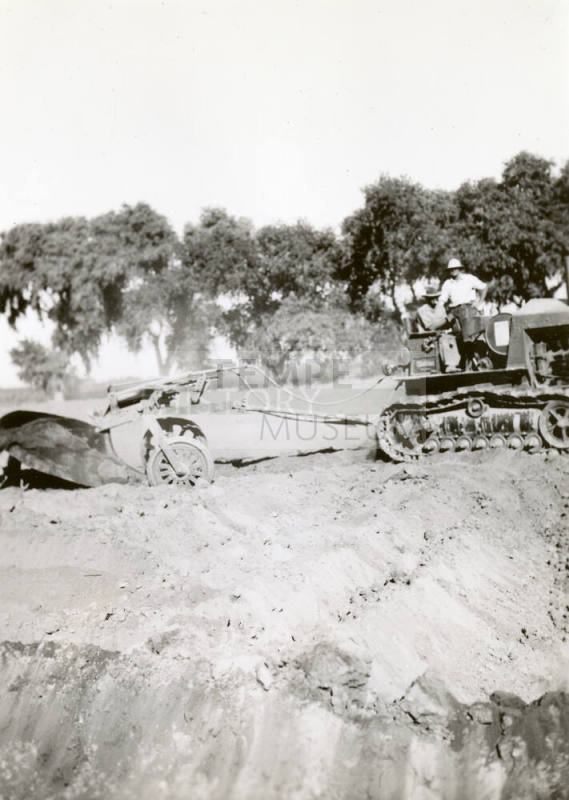Side View of Tractor with Ditch Plow