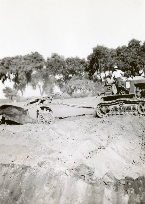 Side View of Tractor with Ditch Plow