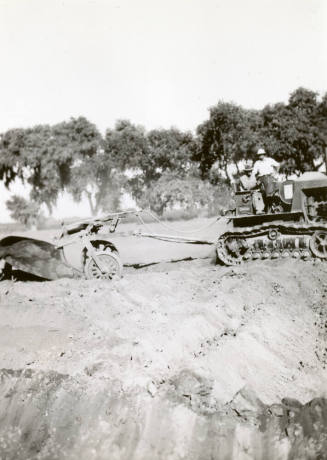 Side View of Tractor with Ditch Plow