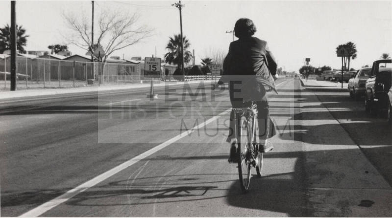 Biker on New College Avenue Bike Path