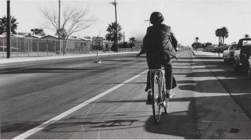Biker on New College Avenue Bike Path