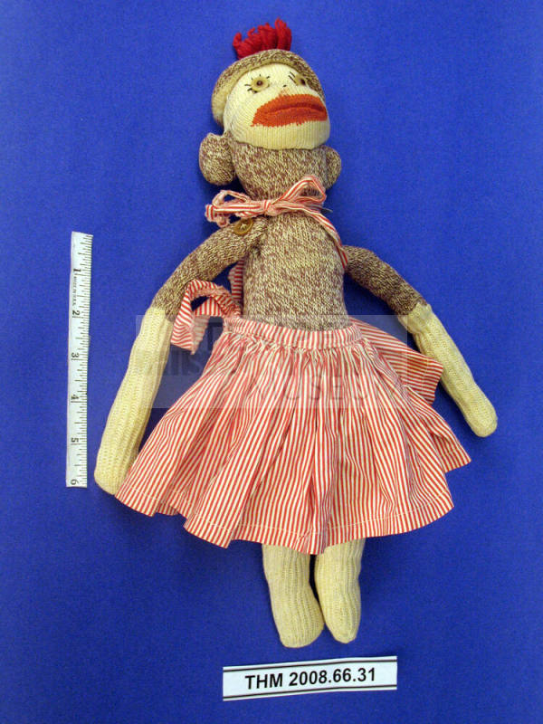 Rockford Sock Monkey Doll with Red-Striped Skirt and Bow
