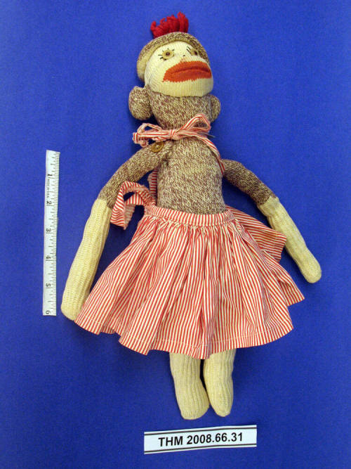 Rockford Sock Monkey Doll with Red-Striped Skirt and Bow