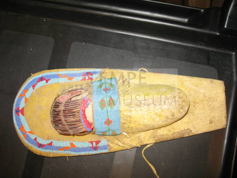 Indian doll in cradle board, Apache