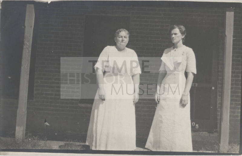 Mary Craig and daughter Estelle on porch of Hackett House