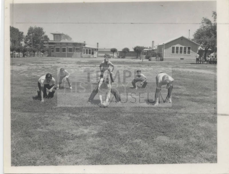 Children Playing Football at Rural School