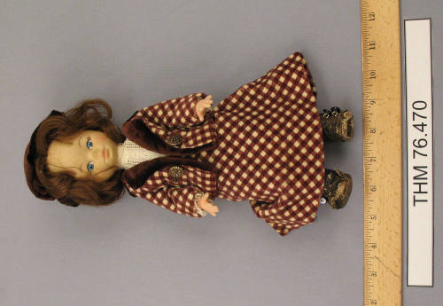 Doll wearing suit