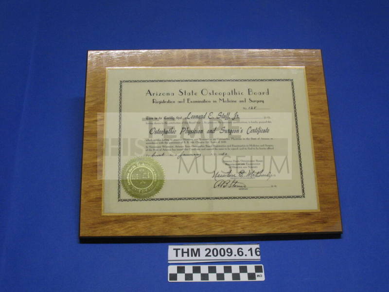 Leonard Staff, Jr.'s Arizona Medical License on wooden plaque