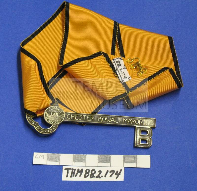 Key of Buffalo, New York attached to gold ribbon
