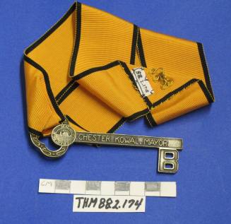 Key of Buffalo, New York attached to gold ribbon
