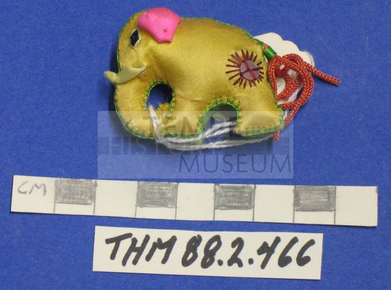 Elephant Figurine, yellow fabric, sequins, red tassel tail