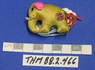 Elephant Figurine, yellow fabric, sequins, red tassel tail