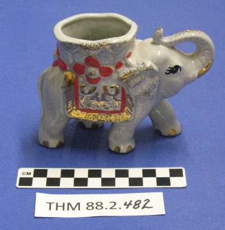 Elephant figurine-container