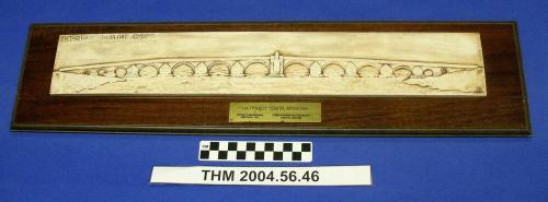 Relief of bridge mounted on wood from Skopje, Macedonia
