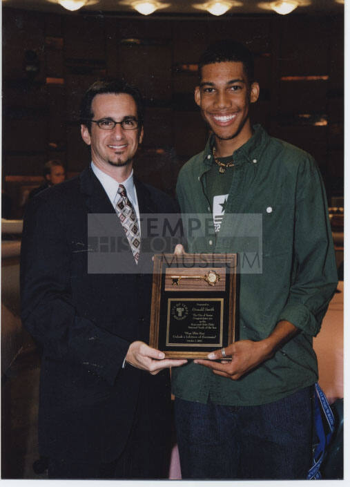 Photograph of National Youth of the Year, Boys and Girls Club, 2002, Mayor Giuliano presents to Donald Smith.