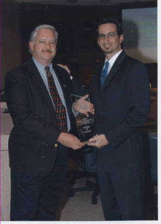 ATA 2004 Excellence Award "Friend of Transit" with Giuliano and man photograph