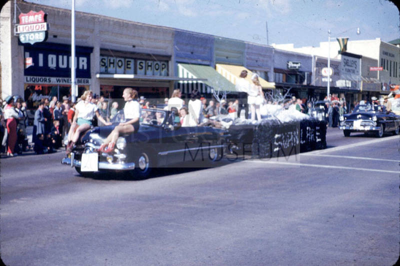 Parade:  Black Convertible Pulling Float - Mill Avenue, Tempe