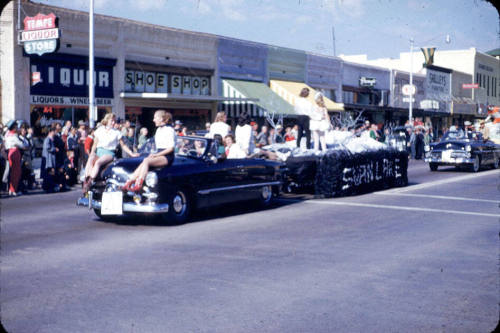 Parade:  Black Convertible Pulling Float - Mill Avenue, Tempe