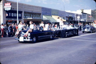 Parade:  Black Convertible Pulling Float - Mill Avenue, Tempe