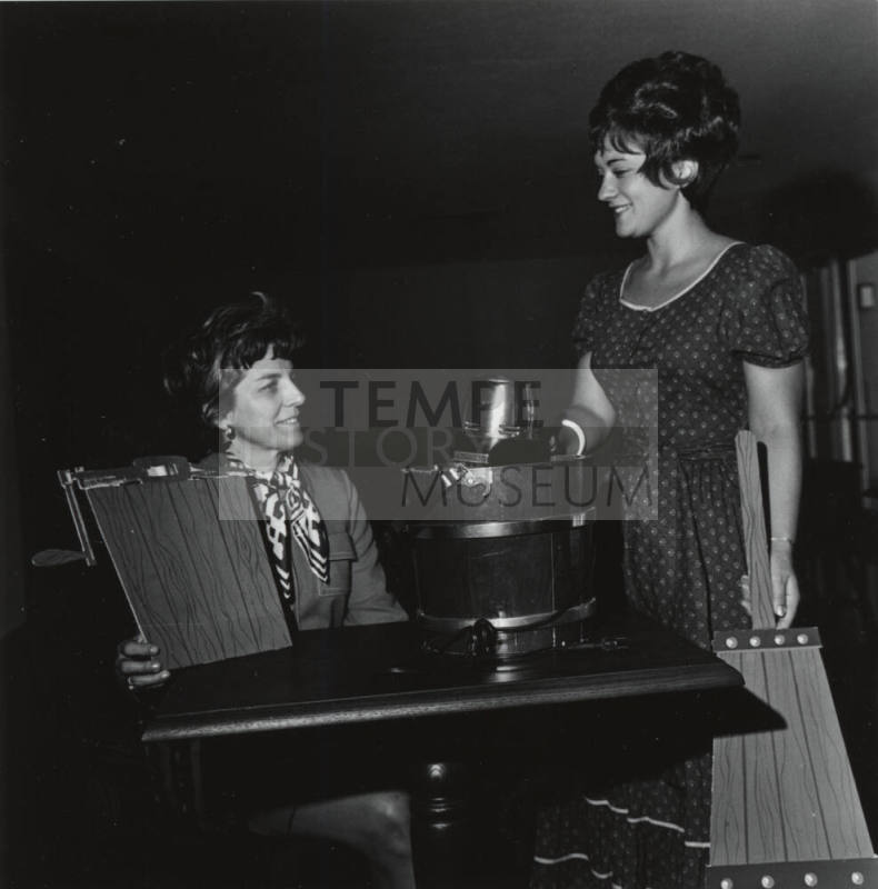 Two Women with a Bottle of Champagne