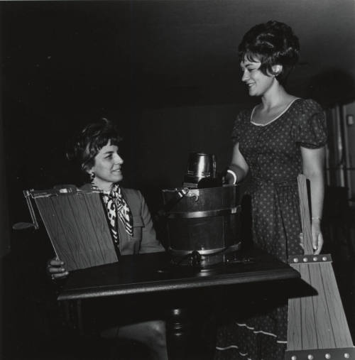 Two Women with a Bottle of Champagne