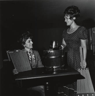 Two Women with a Bottle of Champagne