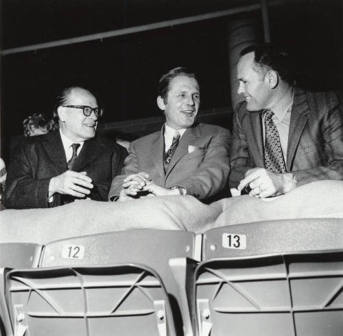 Three Seated Men in Suits, including Mayor Dale Shumway