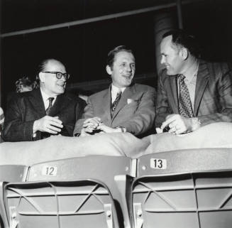 Three Seated Men in Suits, including Mayor Dale Shumway