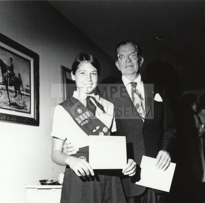 Girl Scout and a Man in a Suit