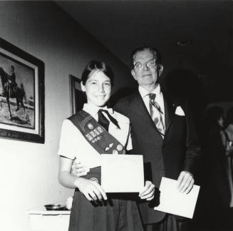 Girl Scout and a Man in a Suit